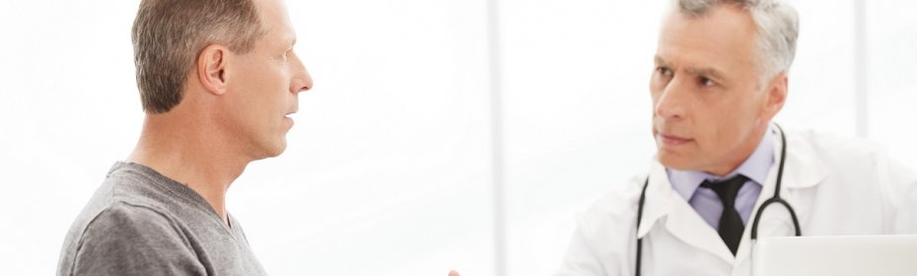 A man with prostatitis at the reception of a urologist